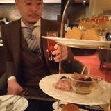 スーツ店マネージャー兼営業マン　佐藤司
