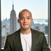 株式会社QuickBuild　新納