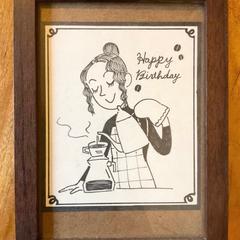 コーヒーを淹れる店長