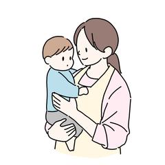 保育士さんに抱っこされる赤ちゃん