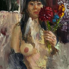 花をもつ女