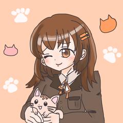 猫を抱っこする女の子