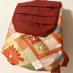 帯のショルダーバッグ