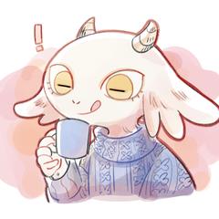 飲み物を飲む山羊の少年