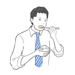 ご飯を食べる男性